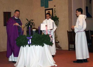 Many families display an Advent Wreath in their homes, and before dinner say prayers of blessing before lighting the candle. The Advent Wreath is the main symbol of the season. You will notice that the wreath has four (4) candles, representing the four weeks of Advent. Each week we light a candle to remind us that the time of salvation draws near. Three of the candles are purple (the first, second and fourth week) -- purple is the color of waiting, conversion and hope. The third week we light a pink or rose-colored candle. It is in the third week that we first hear in the Scriptures of the coming of the Messiah. The color of joy is white and when that is mixed with purple is creates pink. But even in that joy of hearing of the Messiah, we are reminded to continue to focus on our preparations and hence the fourth week is again a purple candle. If you go online you can find prayers for each weeks blessings. How wonderful a custom to be able to bring the symbols of the season into our homes!